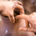 Doug Fitch and Hannah McAndrew making a jug for me